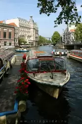 NH Doelen hotel in  Amsterdam and Amstel boat