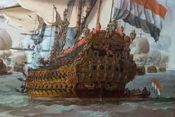 Голландский корабль «Золотой лев» («<span lang=nl>Gouden Leeuw</span>») на картине «Встреча английского корабля «Принц» и голландского корабля «Золотой лев»» Виллем ван де Велде Старший